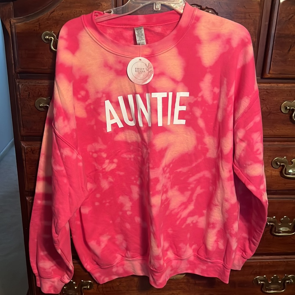 Hot pink and white splotchy AUNTIE size XL worn a few times then stored.